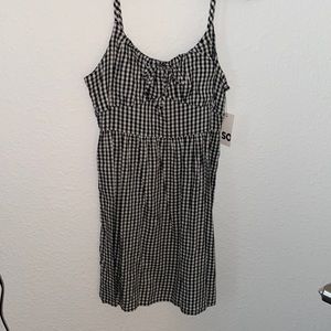 flowy checkered dress.